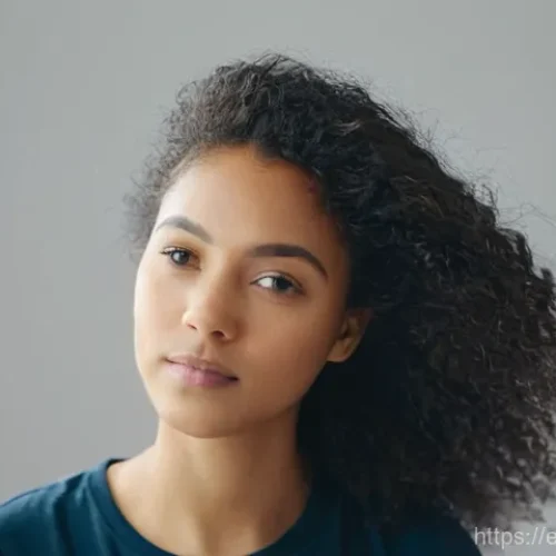 열 손상 방지 헤어 미스트 추천 - **Prompt:** A close-up portrait of a young adult, with a thoughtful expression, gently separating a ...